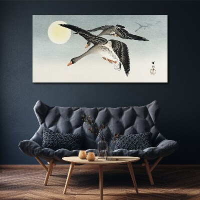 Tablou canvas Gâște în zbor sub lună plină