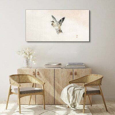 Tablou canvas Zborul păsării în culori delicate