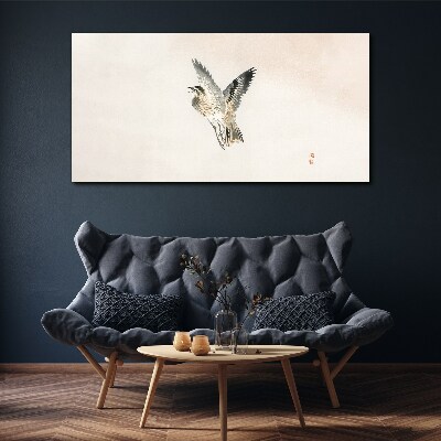 Tablou canvas Zborul păsării în culori delicate