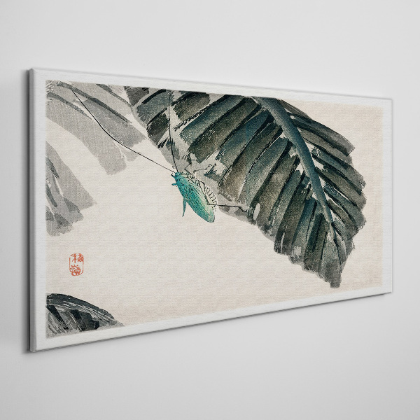Tablou canvas O insectă zveltă pe frunze
