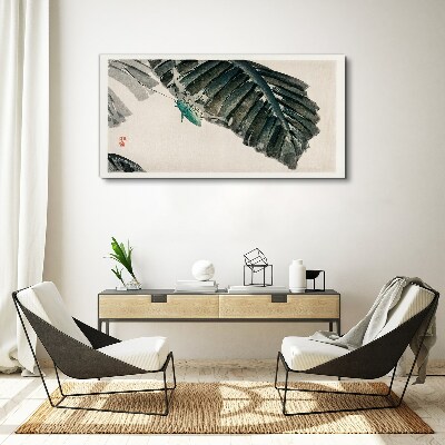 Tablou canvas O insectă zveltă pe frunze