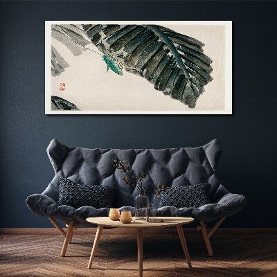 Tablou canvas O insectă zveltă pe frunze