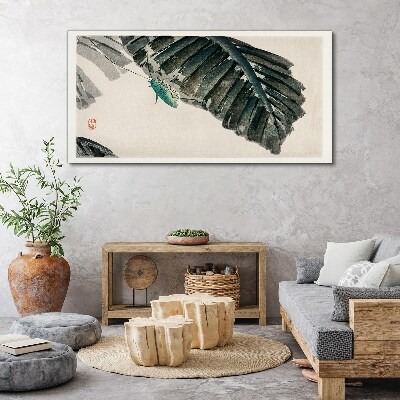 Tablou canvas O insectă zveltă pe frunze