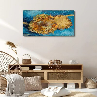 Tablou canvas Floarea soarelui pe fond albastru