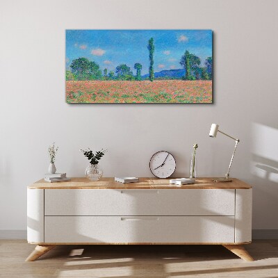 Tablou canvas Câmp de flori sub cerul albastru