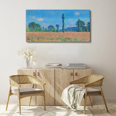 Tablou canvas Câmp de flori sub cerul albastru