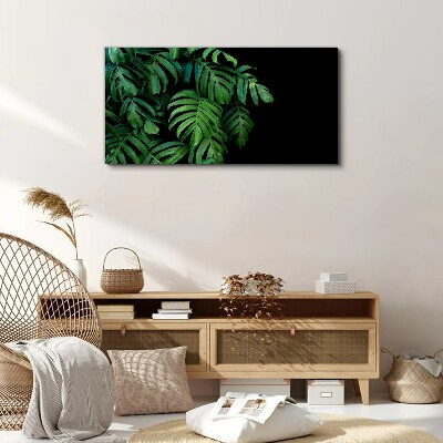 Tablou canvas Frunze verzi pe fond negru