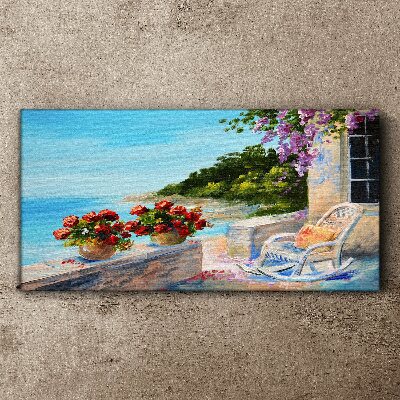 Tablou canvas Flori și mare într-un peisaj însorit