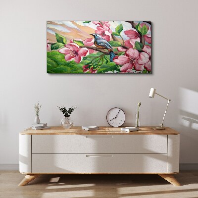 Tablou canvas O pasăre pe un fundal de flori de primăvară