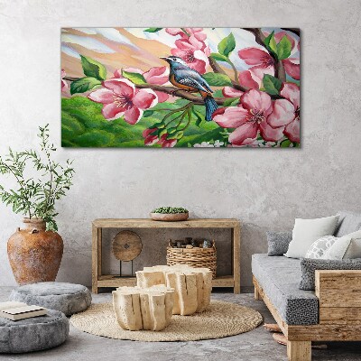 Tablou canvas O pasăre pe un fundal de flori de primăvară