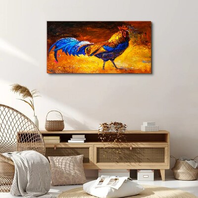 Tablou canvas Cocoș colorat pe fundalul focului
