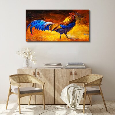 Tablou canvas Cocoș colorat pe fundalul focului
