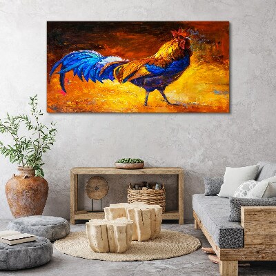 Tablou canvas Cocoș colorat pe fundalul focului