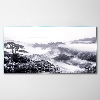 Tablou sticla Panoramă de munte cețoasă