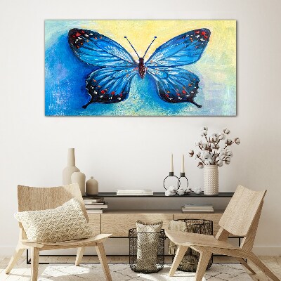 Tablou sticla Fluture albastru pe fundal abstract