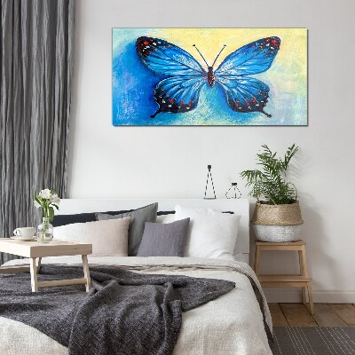 Tablou sticla Fluture albastru pe fundal abstract