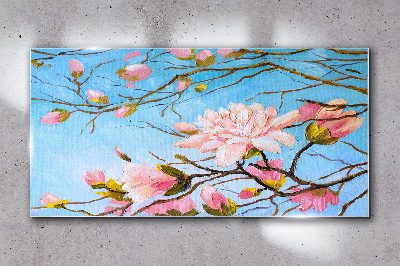 Tablou sticla Flori de magnolie pe fond albastru
