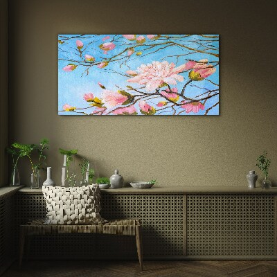 Tablou sticla Flori de magnolie pe fond albastru