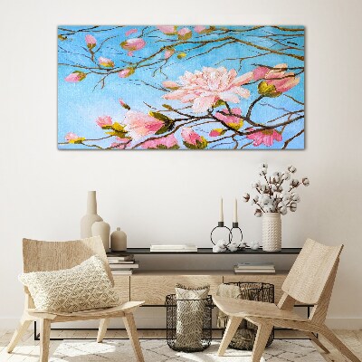 Tablou sticla Flori de magnolie pe fond albastru