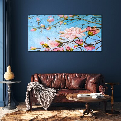 Tablou sticla Flori de magnolie pe fond albastru