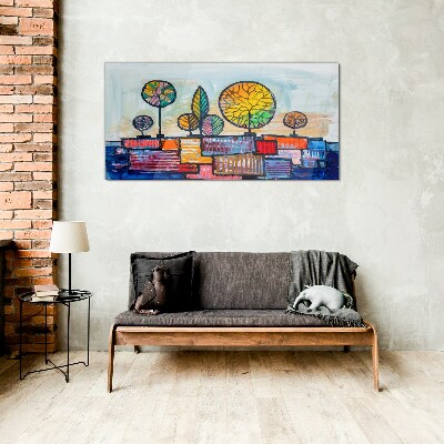Tablou sticla Copaci colorați într-un peisaj abstract