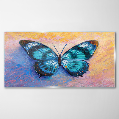 Tablou sticla Fluture albastru pe fundal pastel