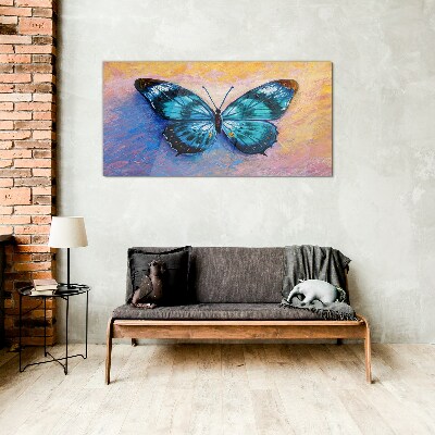 Tablou sticla Fluture albastru pe fundal pastel