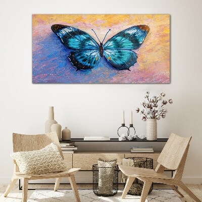 Tablou sticla Fluture albastru pe fundal pastel