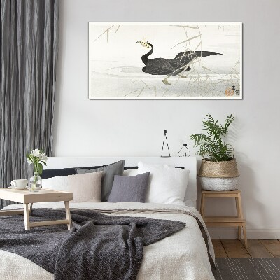 Tablou sticla Cormoran negru printre stuf
