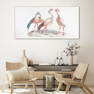 Tablou sticla Trei flamingo roz pe un fundal alb