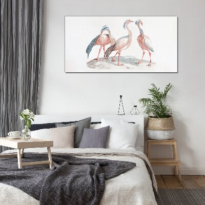 Tablou sticla Trei flamingo roz pe un fundal alb