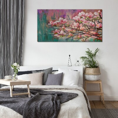 Tablou sticla Flori de magnolie pe fundalul primăverii