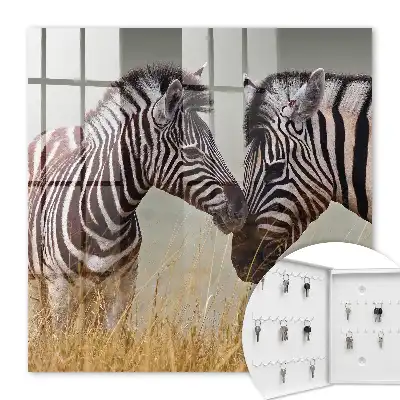 Zebre împreună pe un fundal bej